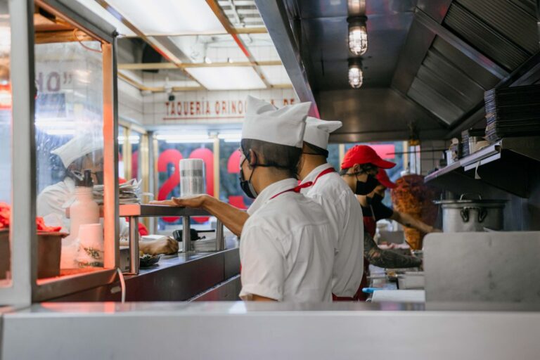 Restaurant kitchen staff working a shift